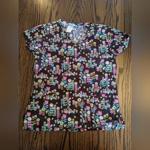 Brown floral scrub top